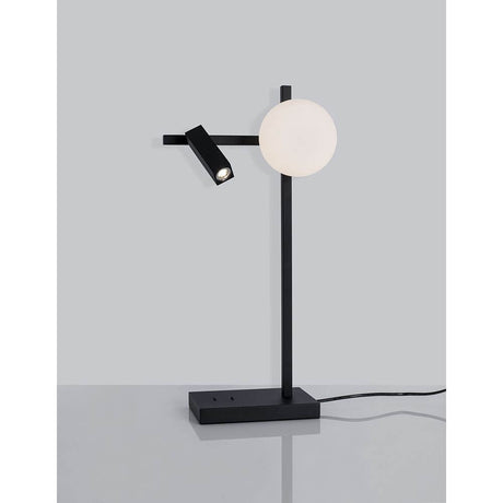 Joline LED Tischleuchte Schwarz auf einem Tisch mit modernem Design und einer runden und einer beweglichen Lichtquelle.
