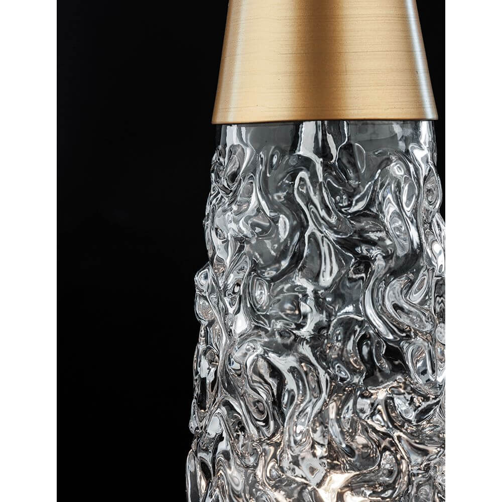 Nova Luce Kovac Pendellampe Stahl Gold mit transparentem Glas und goldfarbenem oberen Teil.