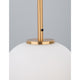 Nova Lace Lato pendant lamp with an opal-white glass sphere shade and brass mount, detail view