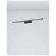 Livia LED Bad Spiegel- & Wandleuchte in modernem Design an einer Wand montiert.