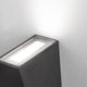 Miley Mini LED-Wandleuchte up&down IP54 in dunklem Design mit warmem Licht an der Wand.