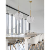 Moderne Mirano Hängeleuchte aus Stahl und Glas über einem eleganten Esstisch in minimalistischer Umgebung.