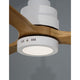 Nahaufnahme des Nature LED Ventilators mit weißem Gehäuse und Holzflügeln aus Walnussholz, energieeffizient und modern.