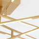 Raccio LED Deckenleuchte Metall im Detail mit goldenen, beweglichen Armen und integrierten LED-Streifen.