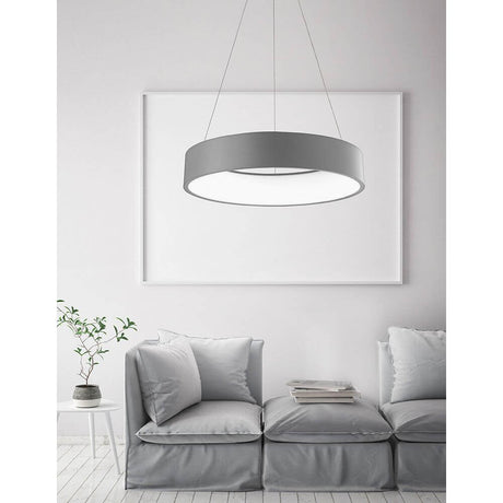 Rando LED pendant lamp Grey Ø 60 cm hangs above a bright living room with modern furnishings.