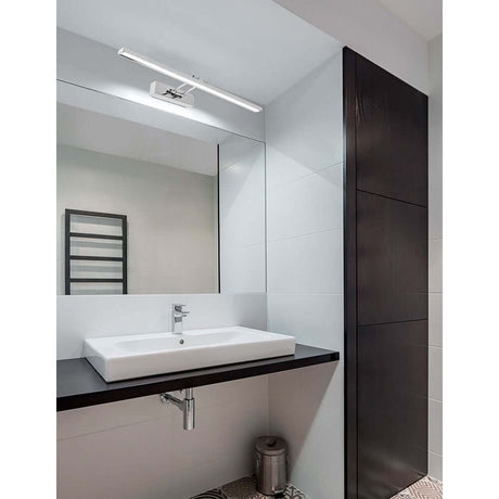 Rosa LED Bad Wandleuchte IP44 über dem modernen Waschbecken in einem eleganten Badezimmer.