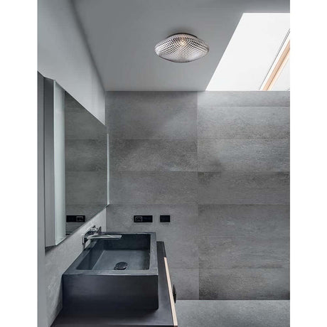 Sens bathroom ceiling light glass in a modern bathroom with elegant furnishings.