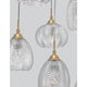 Vario Glas Hängeleuchte 6-flg. in Gold und klarem Glas, modernes Design mit eleganten, gerippten Lampenschirmen.
