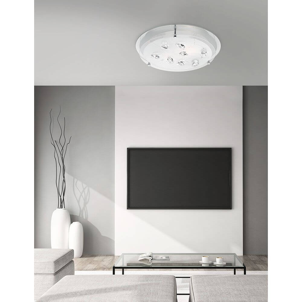 Vedere Kristall-Deckenlampe Chrom Glas in modernem Wohnraum mit TV und Glas-Tisch.
