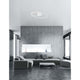 Viareggio LED Deckenlampe Geschwungen über modernem Wohnzimmer mit minimalistischem Aluminium- und Acryl-Design