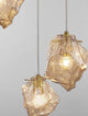 Odelle Pendelleuchte 3-flammig Ø 40cm Gold, Bernstein in modernem Design mit mundgeblasenem Glas.