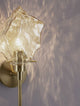 Odelle Wandleuchte Gold, Bernstein mit elegantem, mundgeblasenem Glas und warmem Licht.