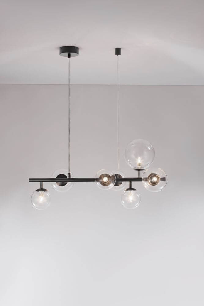Odillia Pendelleuchte G9 7-flammig in modernem Design mit Opalglas und Metalloberfläche.