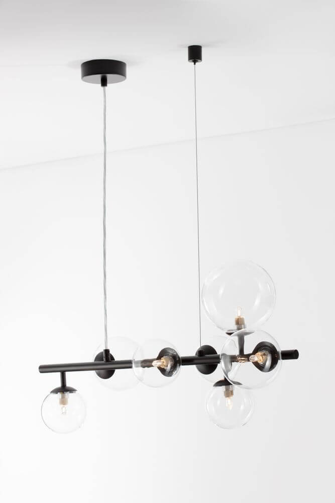Odillia Pendelleuchte G9 7-flammig mit elegantem Design und klaren Glasdiffusoren.