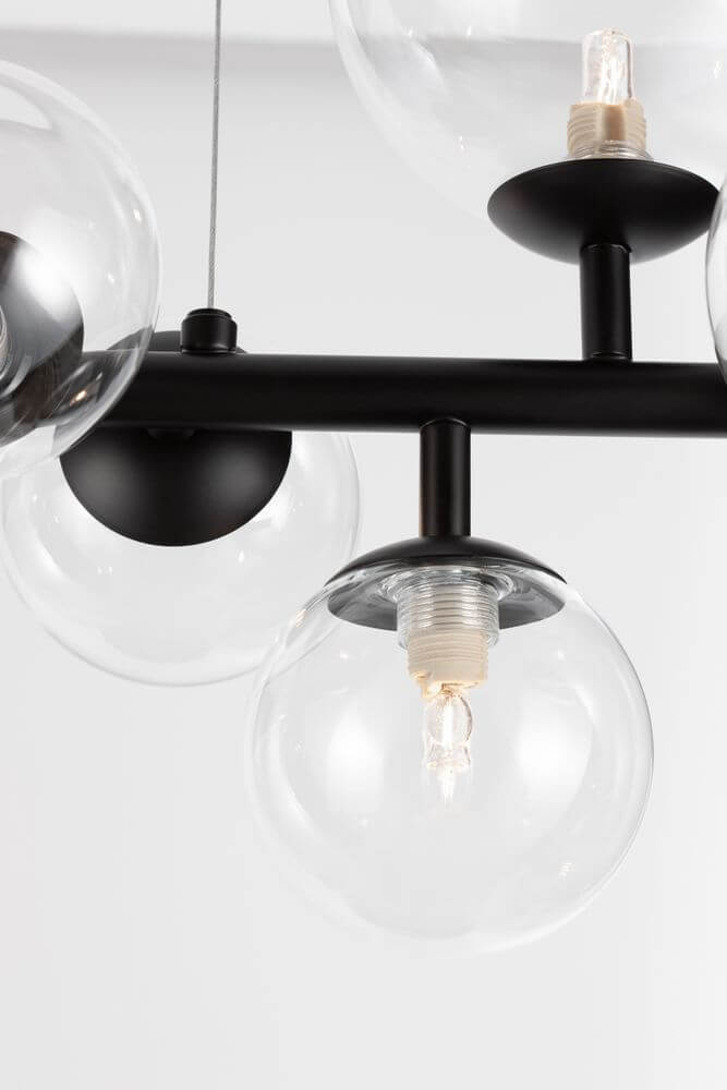 Odillia Pendelleuchte G9 7-flammig mit klaren Glaskugeln und matte schwarze Metalloberfläche.