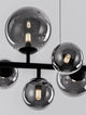Odillia Pendelleuchte G9 7-flammig mit eleganten Opalgläsern und mattgoldenem Metallfinish.