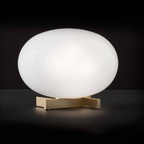 Oluce Glas Tischlampe Alba Alu, Weiß auf einem Tisch mit eleganter, runder Form in hellem Licht.