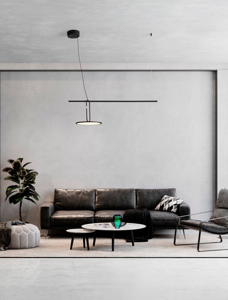 Opi LED Pendelleuchte Horizontal 3000K Schwarz über modernem Wohnzimmer mit Sofa und Couchtisch