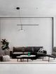 Opi LED Pendelleuchte Horizontal 3000K Schwarz über modernem Wohnzimmer mit Sofa und Couchtisch