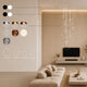 s.luce Orb Galerieleuchte 12-flammig Modular im modernen Wohnraum mit XL Modular Baldachin und flexibler Pendel-Anordnung