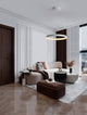 Ormi Pendelleuchte Ø 60cm 2700, 3000K in einem modernen Wohnzimmer mit eleganten Möbeln.