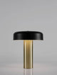 Pandora LED Tischleuchte 3000K Schwarz, Gold auf einem Tisch, moderner Stil, hochwertige Materialien.