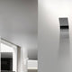 Panzeri App LED-Wandlampe indirekt an modernem weißen Wand in minimalistischem Raum.
