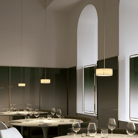 Panzeri Bella Vestita lampshade for pendant light in a stylish restaurant setting.