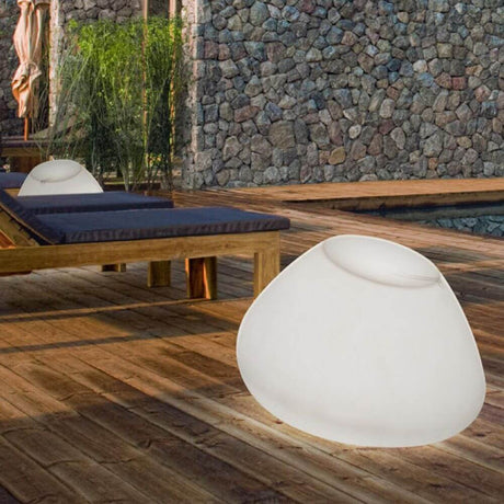 Panzeri Potter outdoor seat with lighting RGBW on a wooden deck outdoors