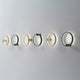 Panzeri Zero Round LED-Wandleuchte Ring in verschiedenen Designs an einer Wand.