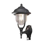 Aplique de exterior Parma con detector de movimiento, negro, con acrílico transparente y un aspecto elegante.