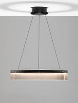 Moderne Pauline LED Pendelleuchte in Schwarz mit sanft gebogenem Glas für sanfte Lichtdiffusion.