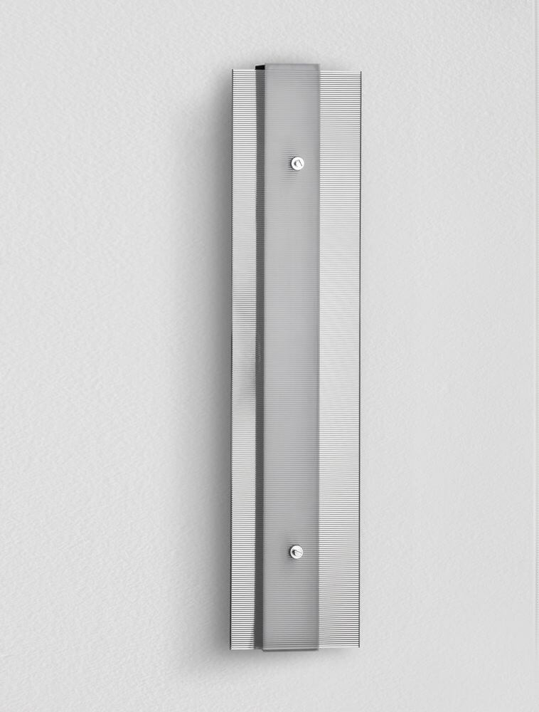 Pauline LED Wandleuchte 3000K Schwarz an einer Wand montiert, modernes Design in Schwarz.