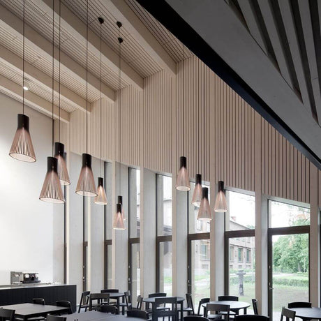 Secto Small 4201 pendant light in wood Ø 25cm in a modern interior with wood details