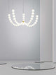 Perla LED Pendelleuchte 55-flammig Ø 118cm 3000K Gold in modernem Interieur