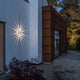 Pescara LED Außen-Wandleuchte Weiß, klares Acrylglas an der Außenwand eines modernen Hauses.