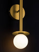 Pielo Wandleuchte G9 H 67cm in modernem Design mit goldfarbenem Metall und opalglas Kugel.