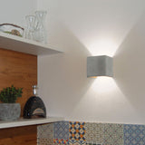 Plinth wall lamp made of concrete gray