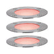 Set aus drei runden Plug & Shine LED Bodeneinbauleuchten mit farbigen LEDs und Edelstahlrahmen.