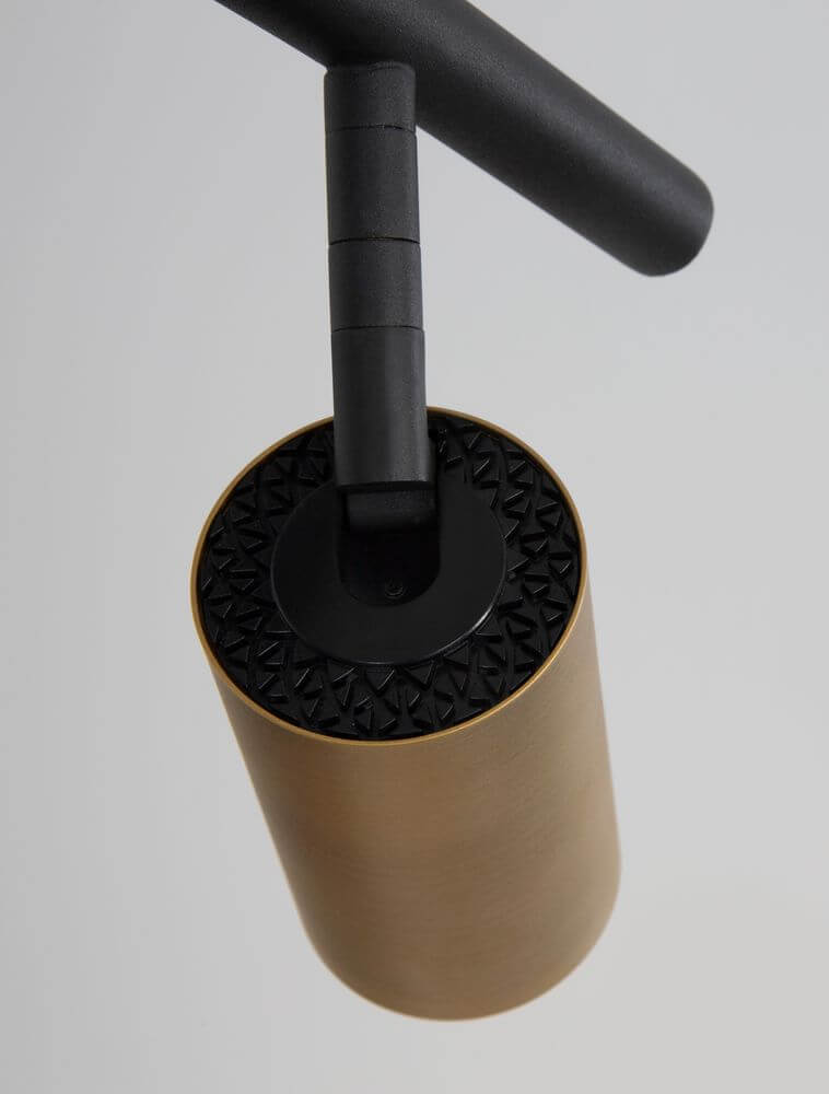 Detailaufnahme der Pogno Pendelleuchte 4-flammig Bogen Schwarz, Gold mit elegantem Design in Gold.