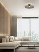 Polifemo LED Deckenleuchte Ø 60cm Up & Down 3000K in modernem Wohnzimmer mit eleganter Einrichtung.