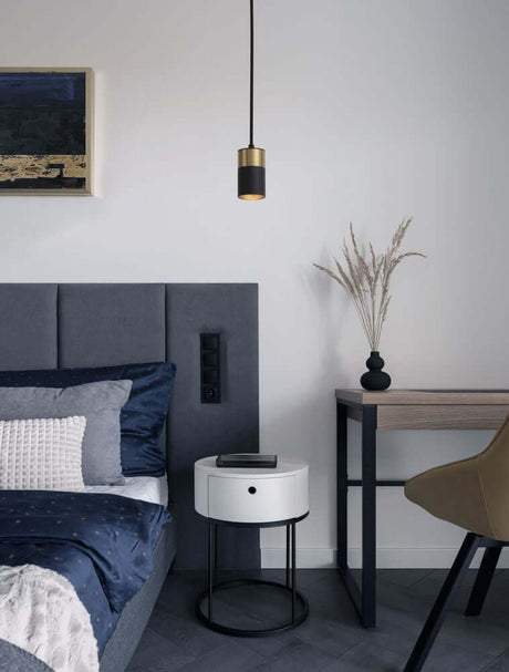 Pongo pendant light cover below Ø 5.6 cm black, gold above the bedside table in a modern bedroom.