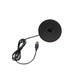 USB-Ladestation für die Positano LED Akku Tischleuchte mit schwarzem Kabel und runder Basis.