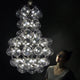 Prince's Design-Kronleuchter 65cm mit luftgefüllten Teilen und modernen LEDs, präsentiert in dunkler Umgebung.