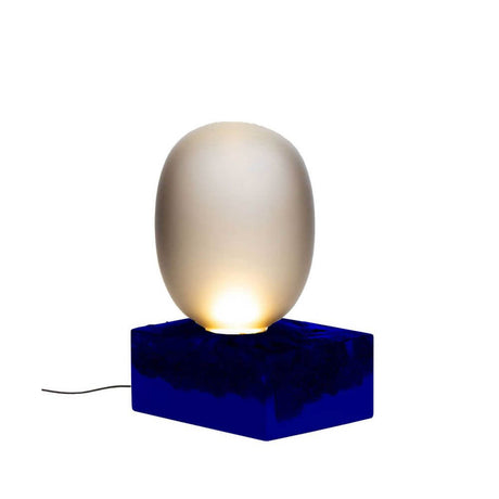 Pulpo LED table lamp Magma Two High Ø 30cm H 55cm on a blue ceramic base, elegant lighting design.
