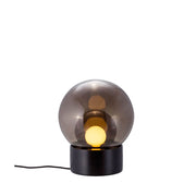 Pulpo LED table lamp Boule Small Ø 29cm with a matt black base and mouth-blown sphere glass.
