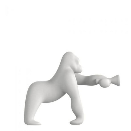 Kong XS table lamp Gorilla in white, sculptural design with adjustable arm for various lighting angles.