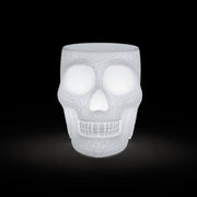 Mexico rechargeable LED stool with remote control as a skull-like lamp with a graphic pattern.