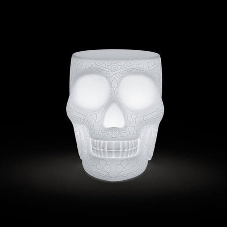 Mexico rechargeable LED stool with remote control as a skull-like lamp with a graphic pattern.