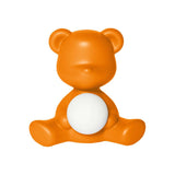 Teddy Girl Akku Tischleuchte in Orange, kabellose Tischlampe im Bären-Design mit leuchtender Kugel.